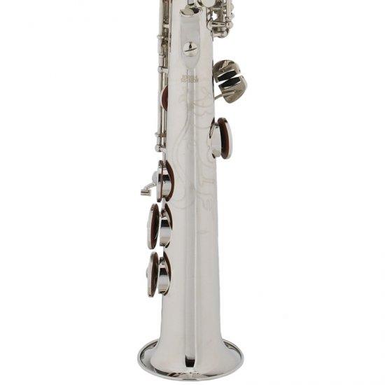 A silver bass flute standing upright on a white background.