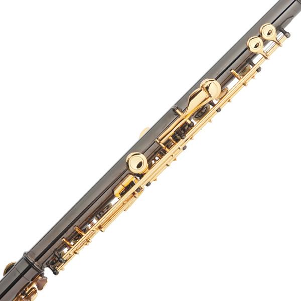 Close-up of a bassoon's keys and wooden body.